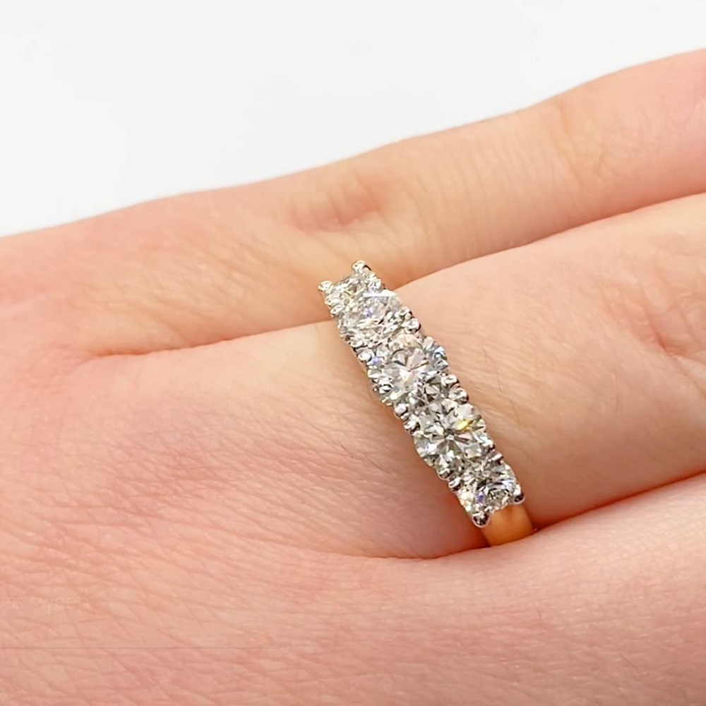 Claw sweep 5 across diamond yellow gold ring