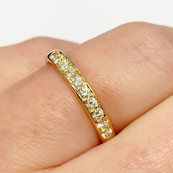 Grain set yellow gold eternity or wedding band
